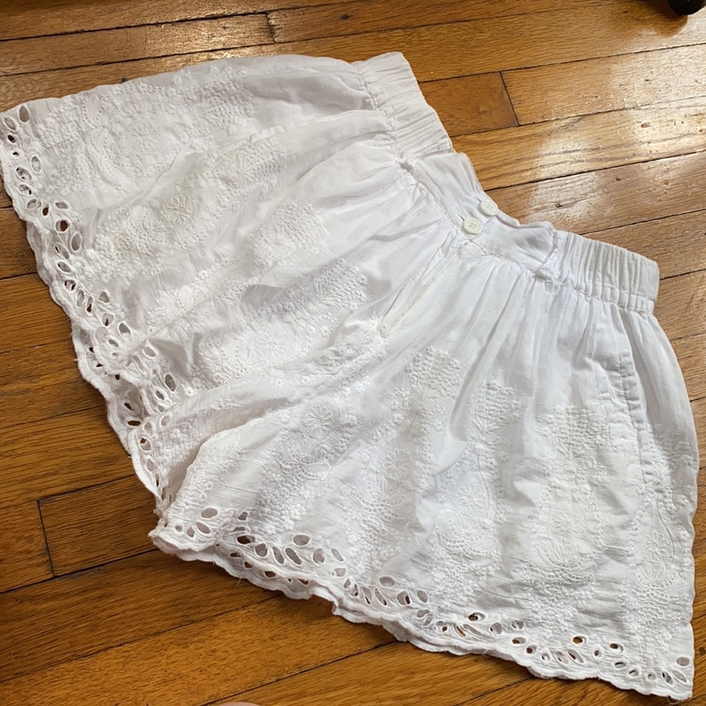White Cotton Eyelet Shorts that mimic a mini skirt